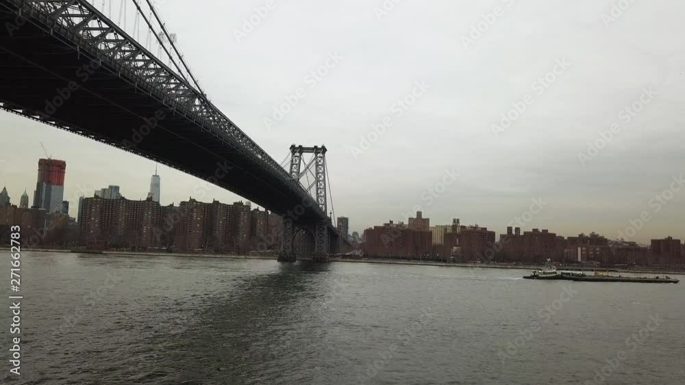 Ship passes under Williamsburg Bridge, aerial Ship passes under Williamsburg Bridge, aerial