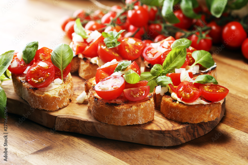 Wunschmotiv: Traditional italian antipasto bruschetta appetizer with cherry tomatoes, cream cheese,