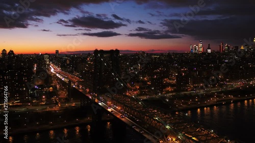 Wallpaper Mural Pan left aerial, cars drive over Williamsburg Bridge at night Torontodigital.ca