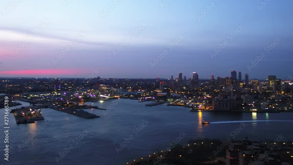 Pan left aerial, New York City skyline over East River Pan left aerial, New York City skyline over East River