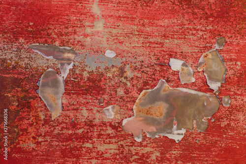 Detail of rusty metal and peeling pant,Detail of peeling red paint and rusty metal
