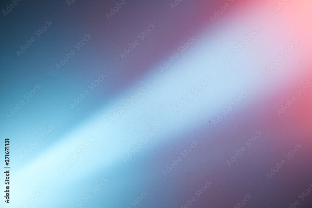 Dark blue and dark purple background with a diagonal light beam