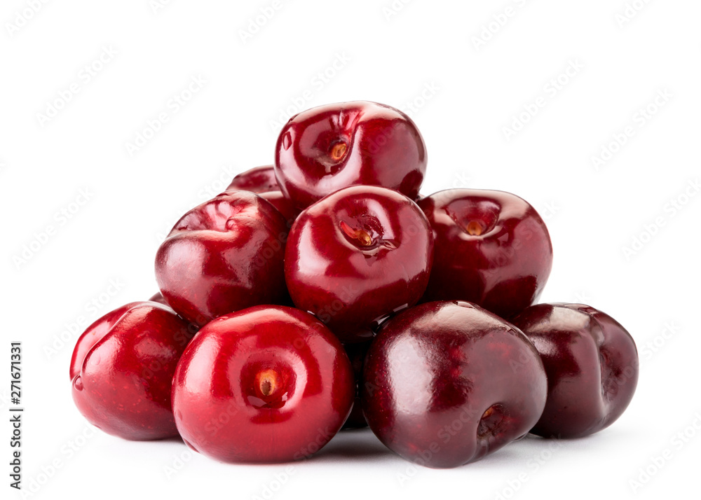 Heap of red cherries close-up on a white. Isolated. Heap of red cherries close-up on a white. Isolated.
