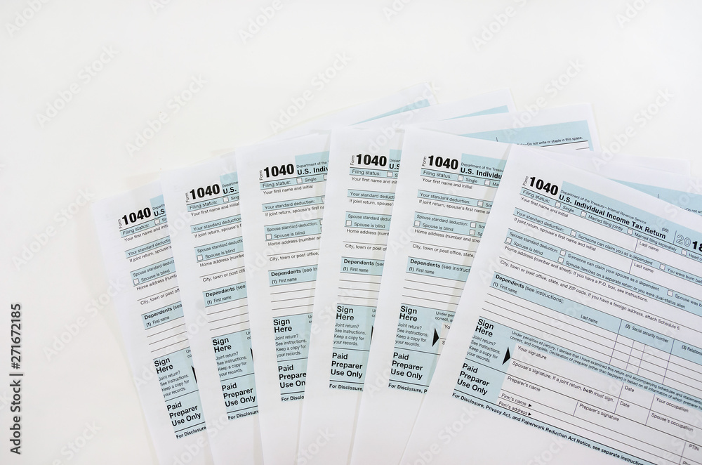 Fototapeta premium tax forms 1040 isolated on white background