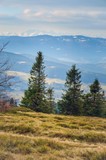Beautiful spring mountain landscape. A rural view of the Polish Tatras and valleys from the surrounding mountains.