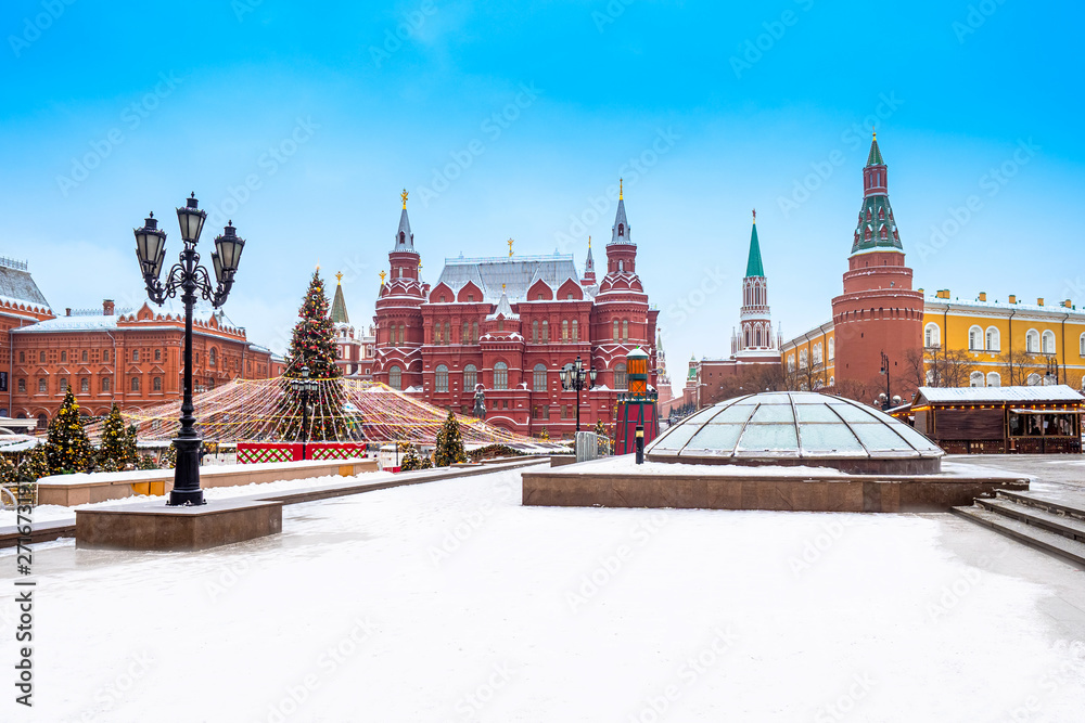 Obraz premium Moscow. Russia. Winter Manege square Christmas decorated. Historical Museum on Manezhnaya square. New year's fair in Russia. Christmas decoration of Moscow streets. Weekend vacation in Moscow center.