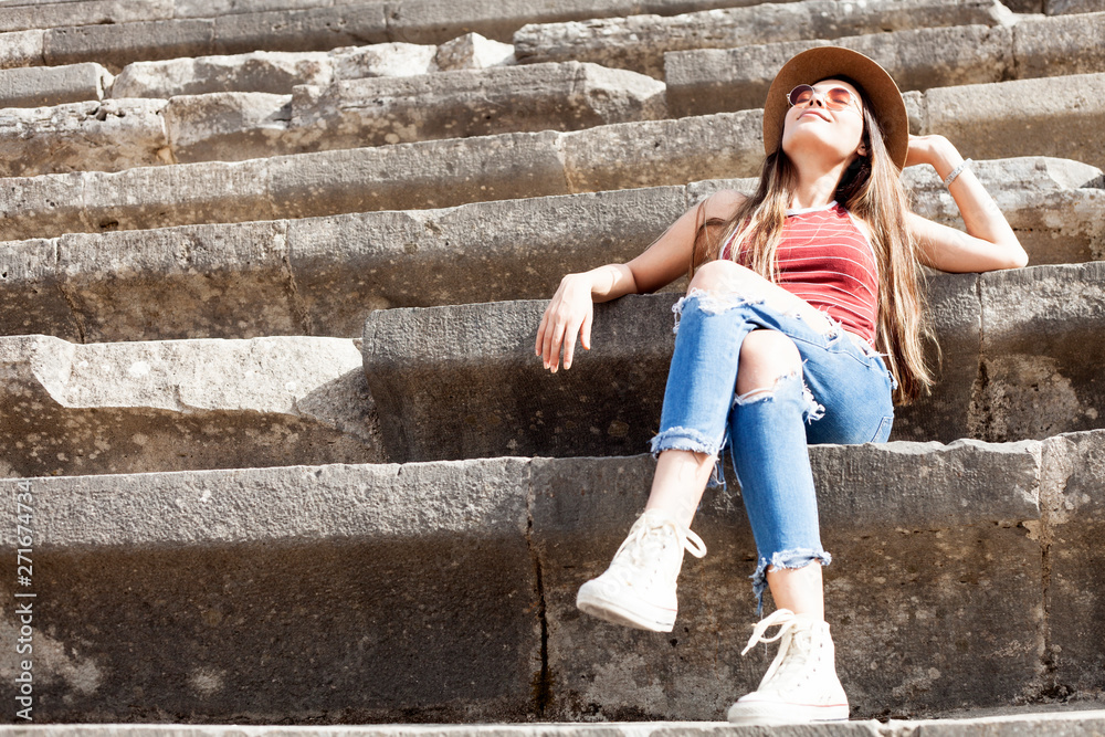 beautiful tourist woman visiting ancient city in Antalya Turkey beautiful tourist woman visiting ancient city in Antalya Turkey