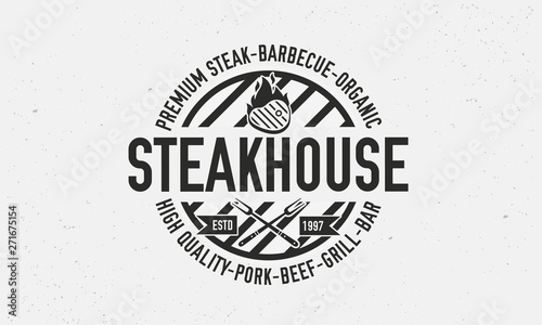 Vintage Steakhouse Logo. Steak grill retro logo template. Barbecue restaurant emblem. Vector Illustration. 