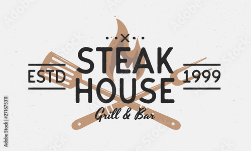 Steak House, Barbecue, Grill logo. Vintage Restaurant poster. Trendy retro logo design. Grill fork, Spatula and fire flame. Vector illustration