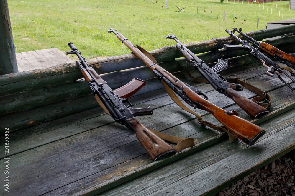 military training. the weapon is at the ready. machine guns, rifles, and machine guns. all different eras.