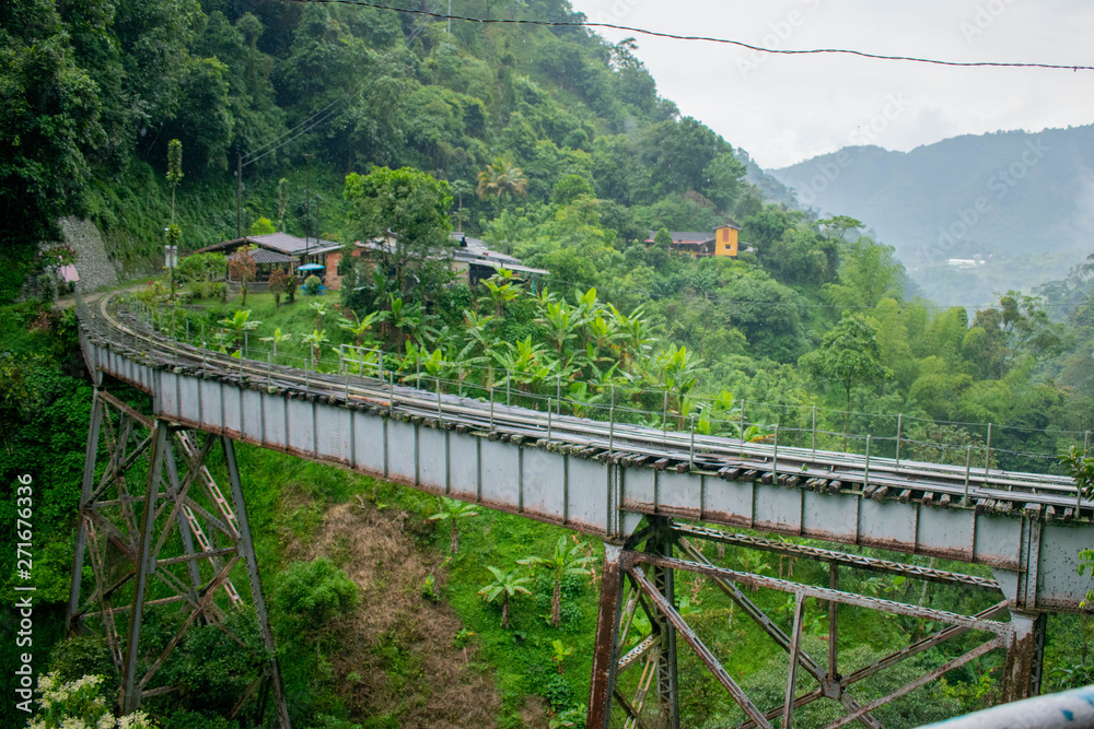 Abandoned Railroad Bridge over a Valley in the Jungle in Colombia