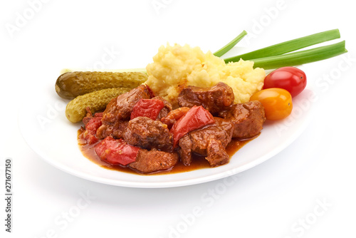 Beef stew, meat goulash, Hungarian bograch, close-up, isolated on white background