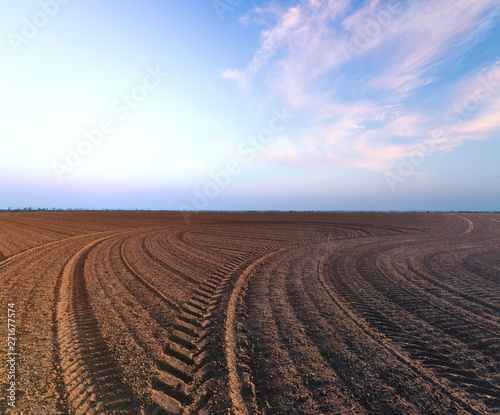 agriculture the land is ploughed to the field   background photo out of the city agriculture