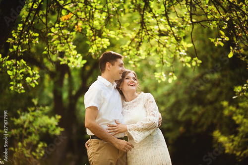 Charming and fashionable couple in love background old vintage castle