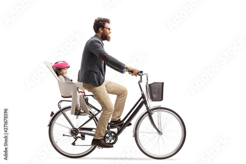 Father riding a child in a bicycle child's seat