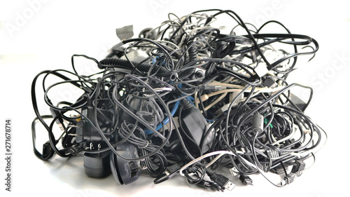 A large bundle of used multi-colored electronic cords and cables to be recycled for copper, brass, and other valuable metals.