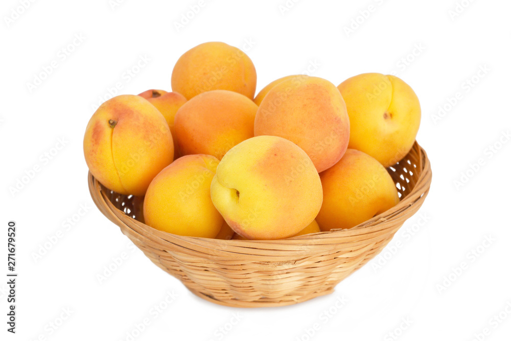 Bowl of apricots isolated on white background