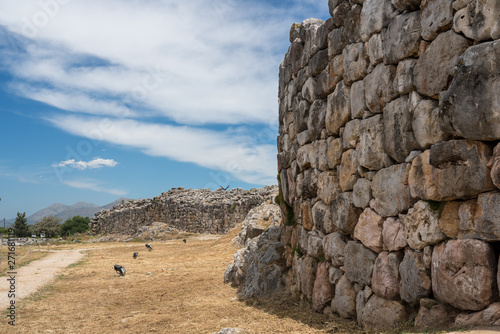 Massive boulders form the walls of the fortress and palace of Tiryns in Greece photo