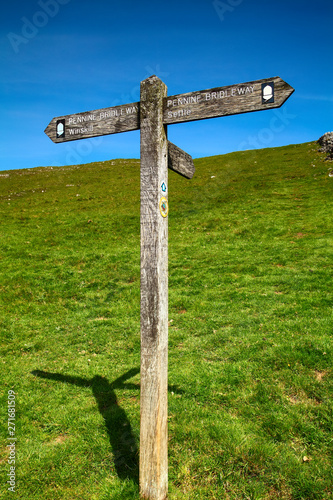 Pennine bridleway wooden sign marking the way for Winskill and Settle in the Yorkshire Dales photo