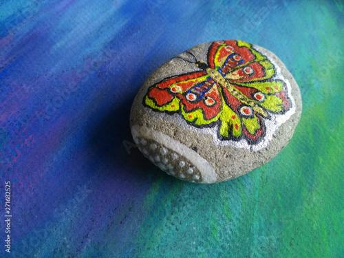 butterfly round stone pattern nature bright color blue green background pastel abstract pattern colored dots