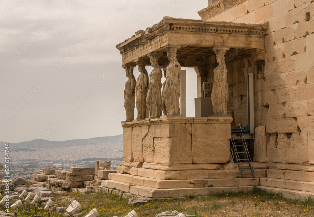 Ancient statues of the Caryatids on the Erechtheion or Erechtheum temple in Acropolis