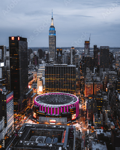 view from top on Madison Square Garden and Empire State Building. Night Lights