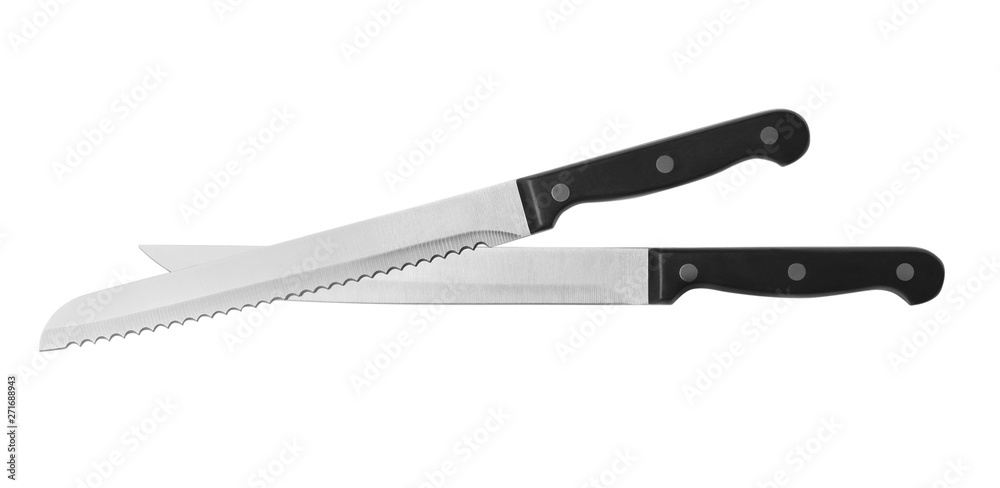 Stainless steel knives on white background, top view Stainless steel knives on white background, top view