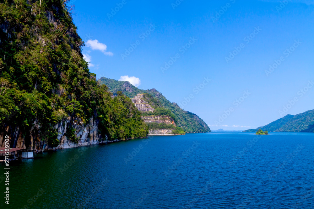 Waterproof dam with cliff and blue sky