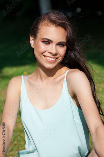 Portrait of beautiful young happy woman