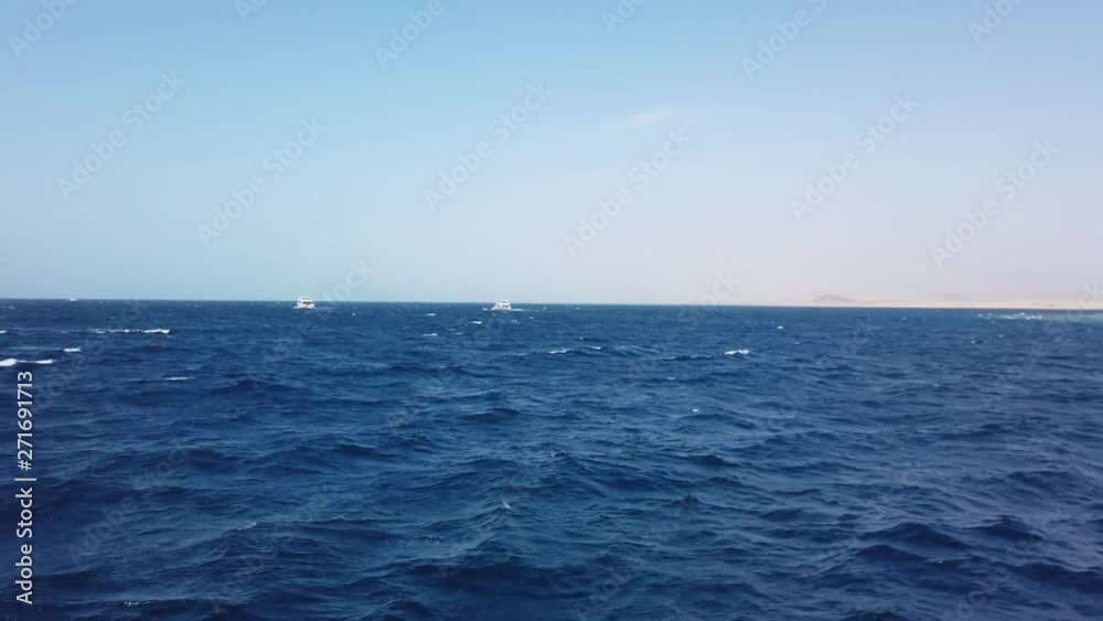 Yacht sailing on opened sea. Sailing boat. Yachting video. Sailing video. Yachting at windy day. Yacht. Sailboat.