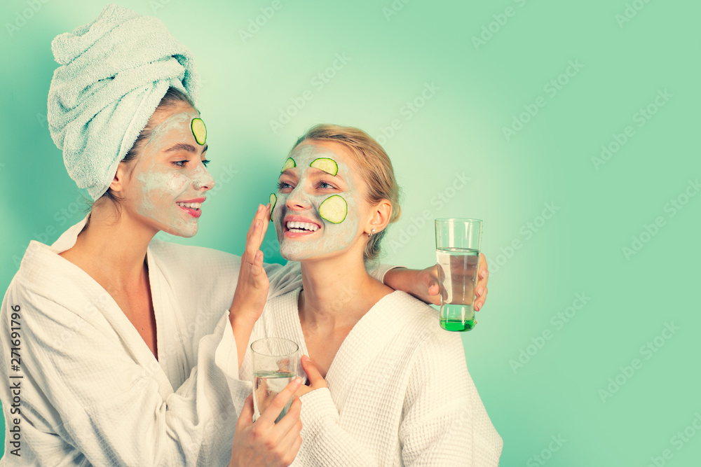 Anti age mask. Stay beautiful. Skin care for all ages. Women having fun  cucumber skin mask.