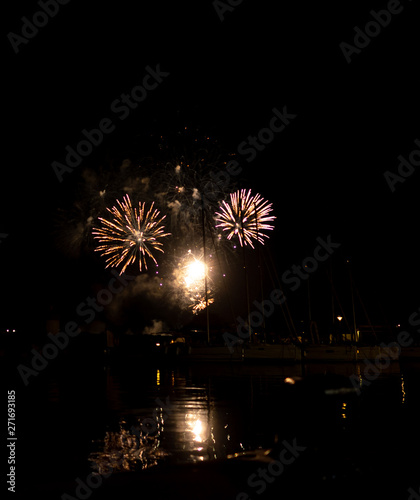 fireworks for Bastille day celebration on sea port in French Riviera