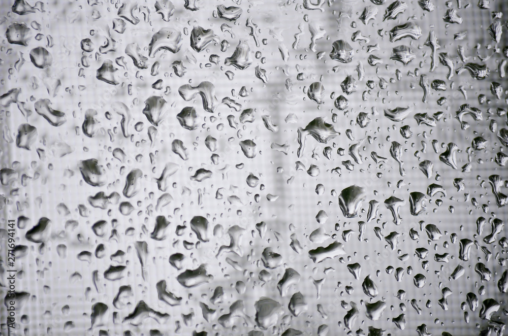 Close Up of Raindrops on Window on a Gray Rainy Day Close Up of Raindrops on Window on a Gray Rainy Day
