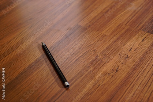 pen on wood