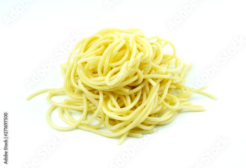 Spaghetti on white background. Yellow italian pasta. Food wallpaper Ingredients for cooking italian pasta.