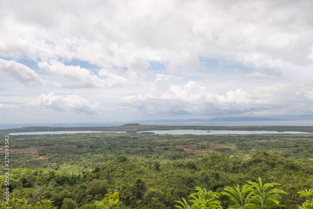 Naklejka premium Cebu Province Camotes Islands lake danao mountain view with background of another islands in the sea 