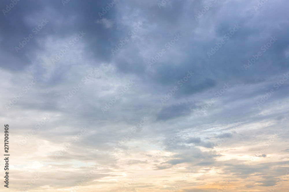 Obraz premium blue sky background texture with white clouds sunset.