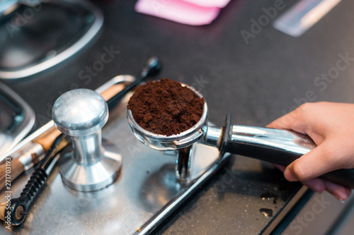 Coffee powder on coffee tamper