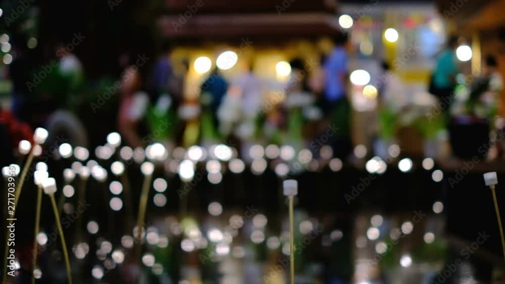 Flower lanterns bokeh light at night market scene background Flower lanterns bokeh light at night market scene background