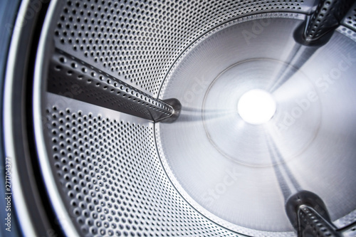 Close up photo of inside washing machine drum