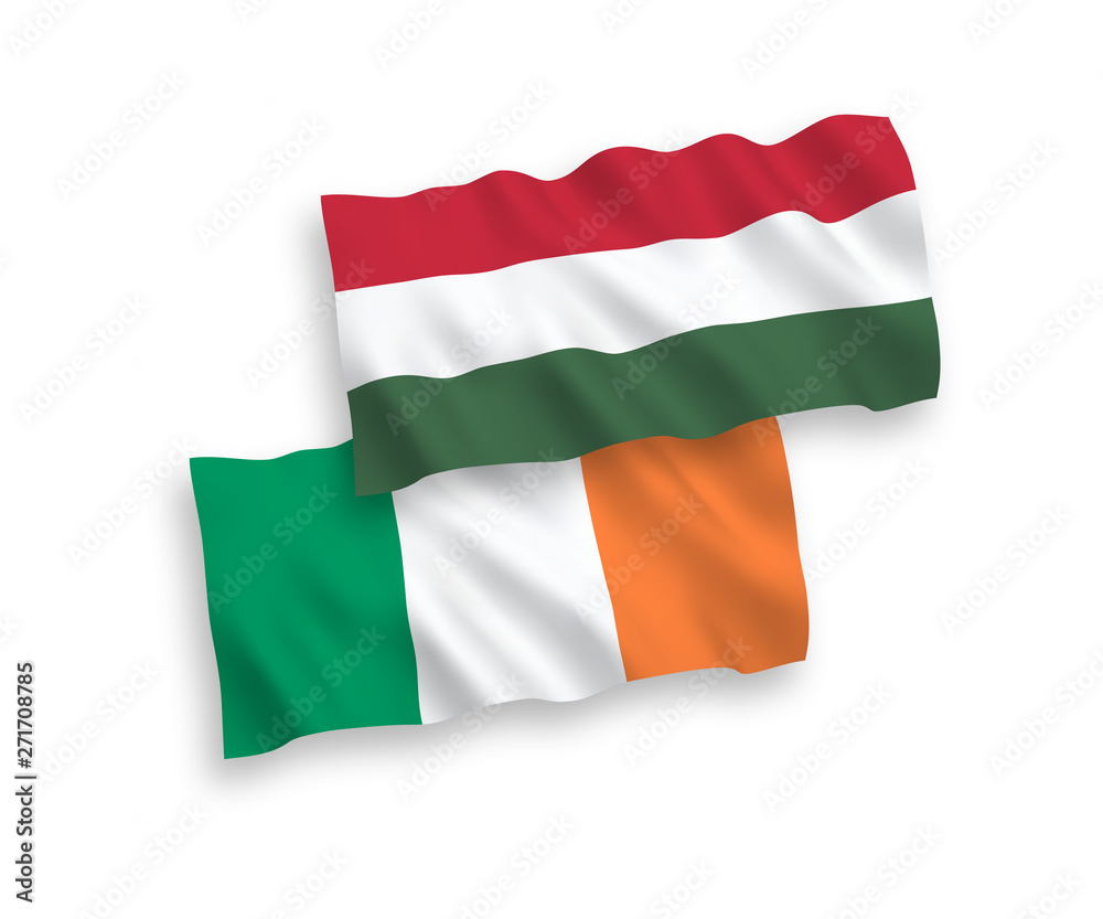 National vector fabric wave flags of Ireland and Hungary isolated on white background. 1 to 2 proportion. National vector fabric wave flags of Ireland and Hungary isolated on white background. 1 to 2 proportion.