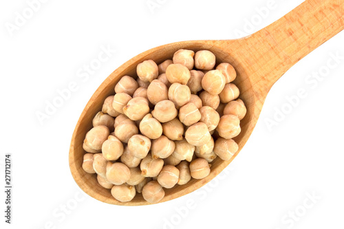 Small wooden spoon  with chickpeas seen isolated on white background.