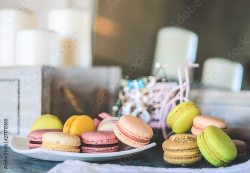 colorful cookies macaroons on a vintage table