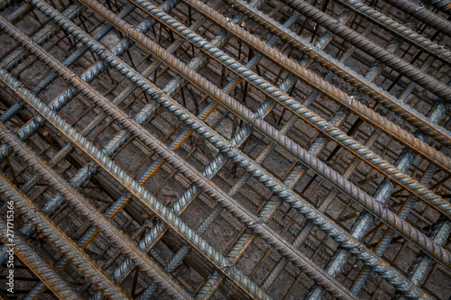 a thick metal rod laid in a grid as a background texture