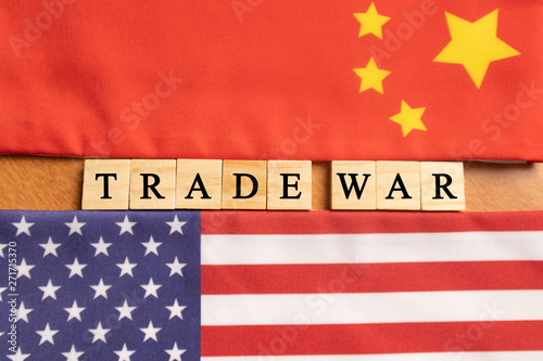Maski, India 29,May 2019 : China-US trade war concept - flag of China and the United States with wooden block lettes