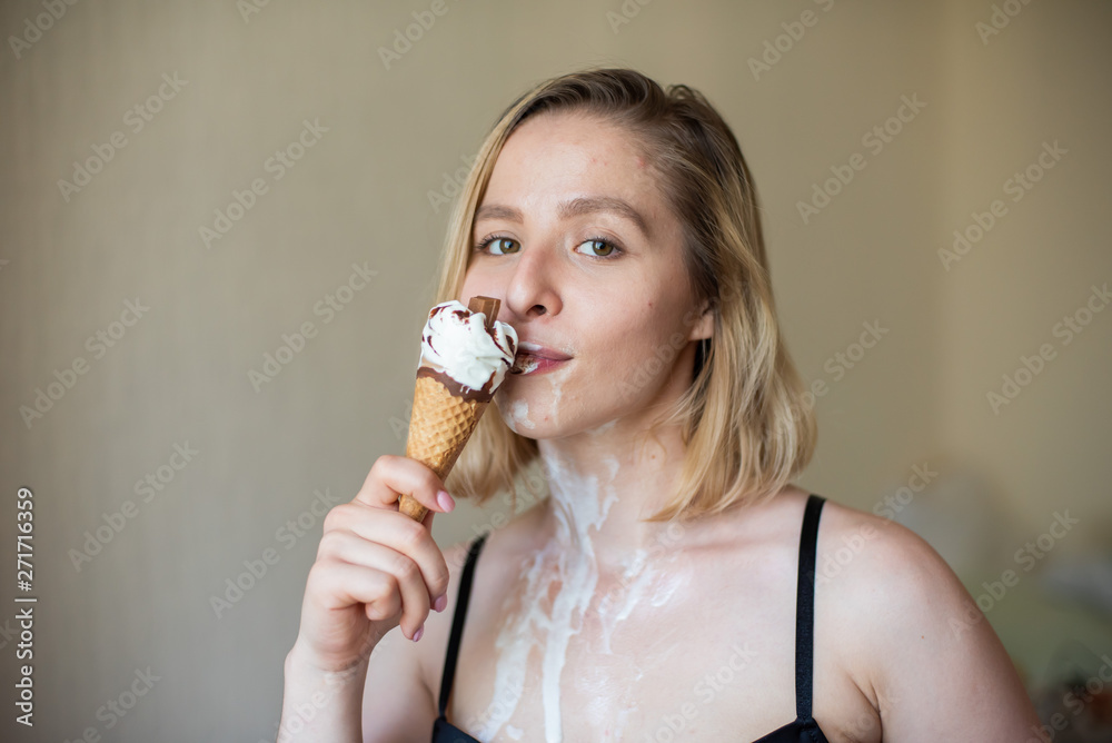 Sexy blonde licks a waffle cone. Ice cream is melting, erotically draining  through the body of an attractive woman. Beautiful girl smeared with ice  cream. Stock Photo | Adobe Stock