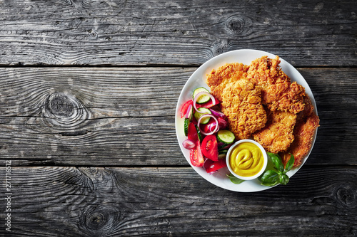 Φωτογραφία Parmesan breaded chicken breast cutlets, flat lay