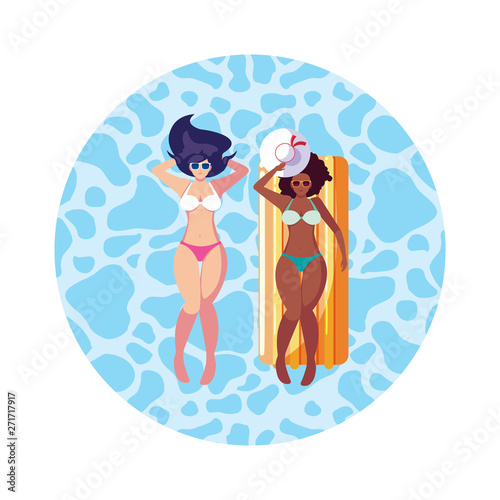 beautiful interracial girls with float mattress in water
