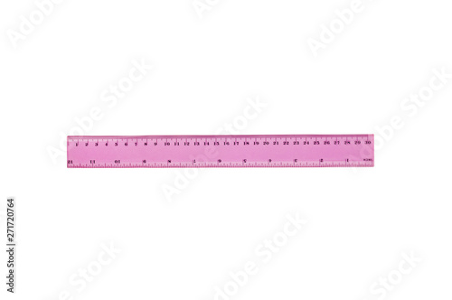 One plastic pink ruler with degrees and digits for education or work isolated on white background. Top view