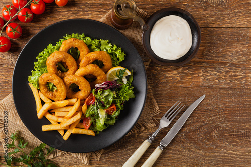 Roasted squid rings with fries